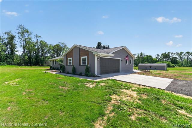 Builiding view four for 2601 Westwind, Highland, MI. 48357