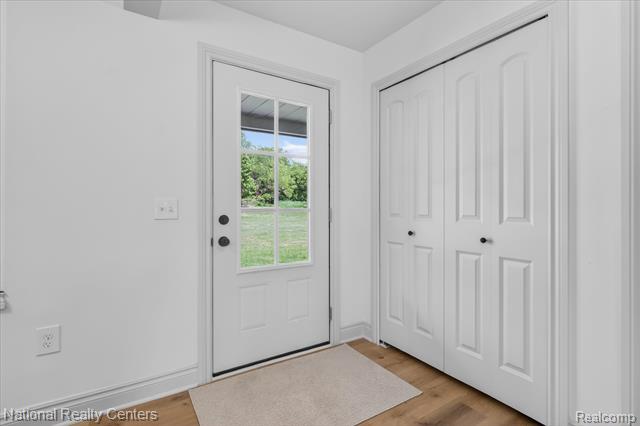Builiding view seven for 2601 Westwind, Highland, MI. 48357