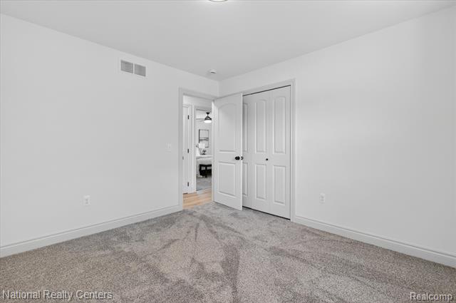 Builiding view thirty for 2601 Westwind, Highland, MI. 48357