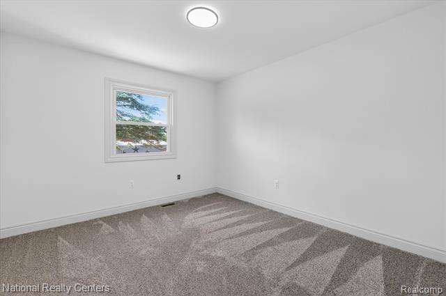 Builiding view twenty nine for 2601 Westwind, Highland, MI. 48357