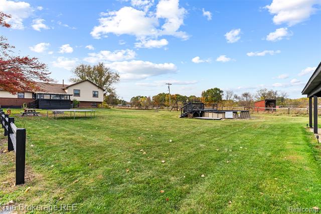 Builiding view forty five for 5950 Carscadden Way, Highland, MI. 48357