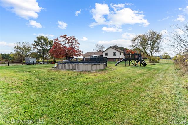 Builiding view forty six for 5950 Carscadden Way, Highland, MI. 48357