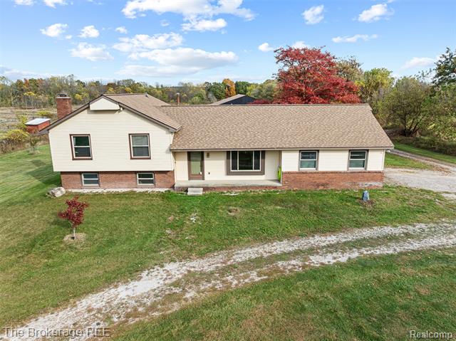 Builiding view forty two for 5950 Carscadden Way, Highland, MI. 48357