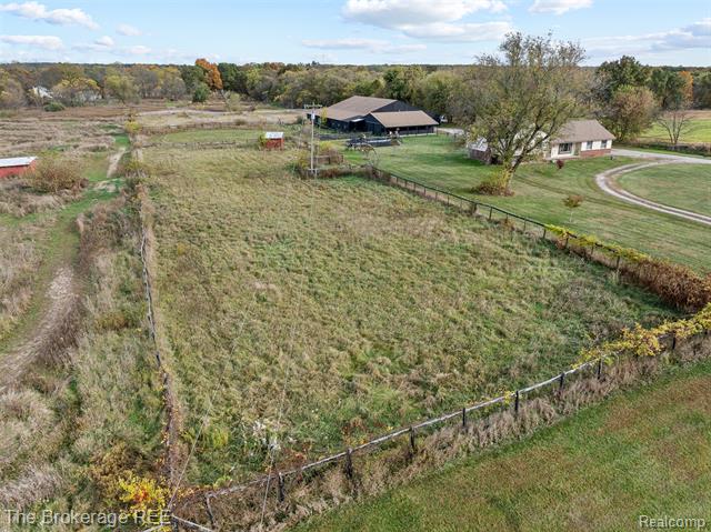 Builiding view seventy for 5950 Carscadden Way, Highland, MI. 48357