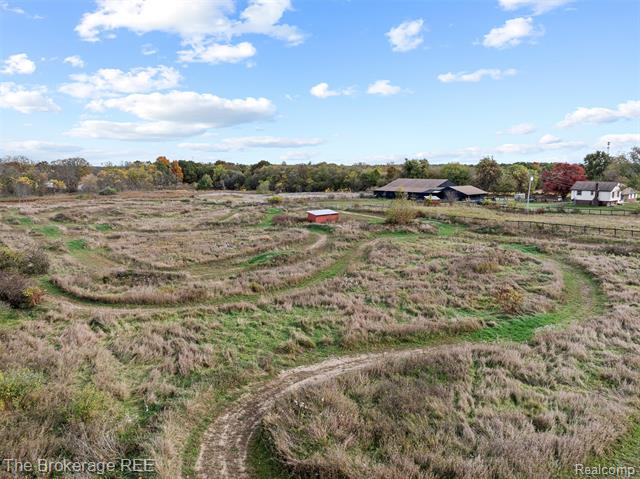 Builiding view sixty eight for 5950 Carscadden Way, Highland, MI. 48357