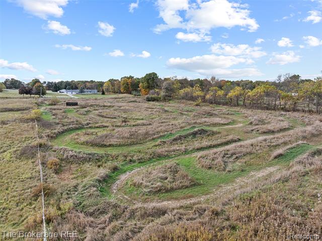 Builiding view sixty nine for 5950 Carscadden Way, Highland, MI. 48357