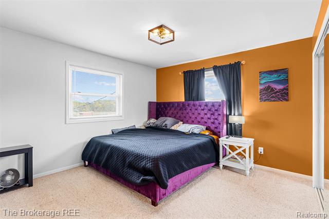 Builiding view thirty for 5950 Carscadden Way, Highland, MI. 48357