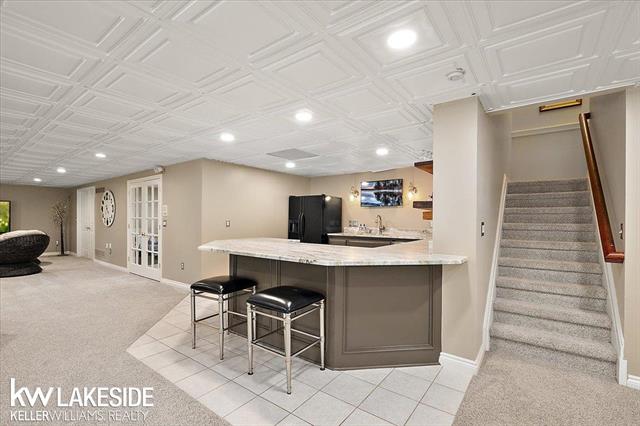 Builiding view eighty for 1387 Pebble Ridge, Rochester, MI. 48307