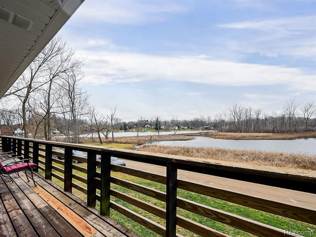 Builiding view twenty four for 9900 S Big School Lot Lake, Holly, MI. 48442