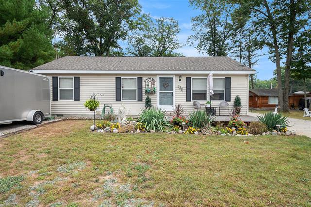 front view for 128 Maple Bluff Avenue, Prudenville, Mi. 48651