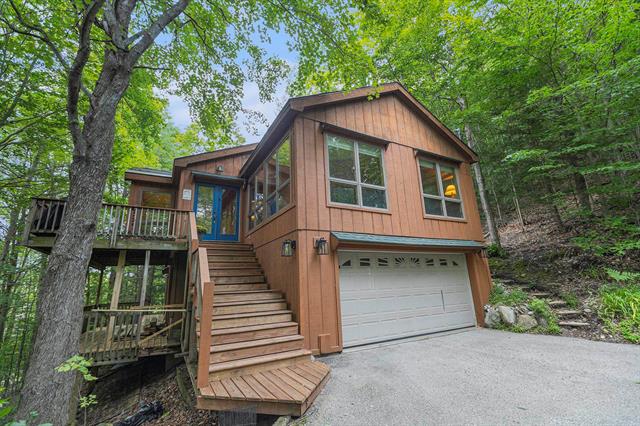 front view for 13005 S Partridge Run Drive, Traverse City, Mi. 49684