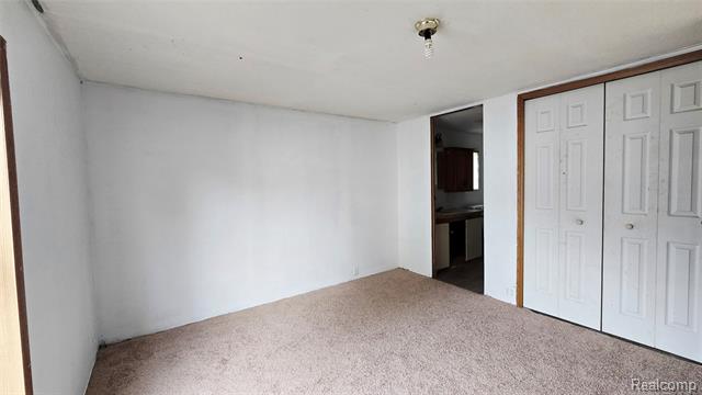 Builiding view five for 5445 Americana Lane, Casco, MI. 48064