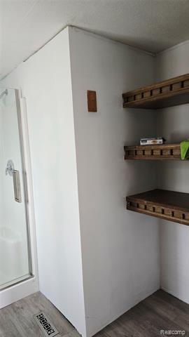 Builiding view four for 5445 Americana Lane, Casco, MI. 48064