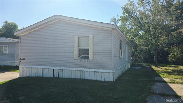 Builiding view one for 5445 Americana Lane, Casco, MI. 48064