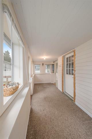 Builiding view eighteen for 128 1St, Milan, MI. 48160