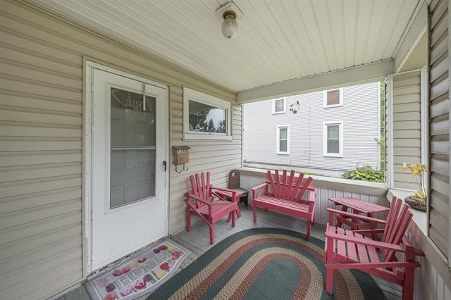 Builiding view two for 128 1St, Milan, MI. 48160