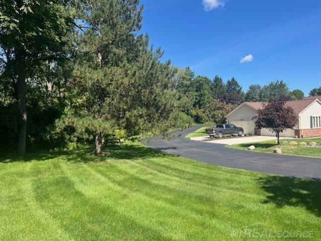 Builiding view sixteen for 70135 Whitetail, Romeo, MI. 48065