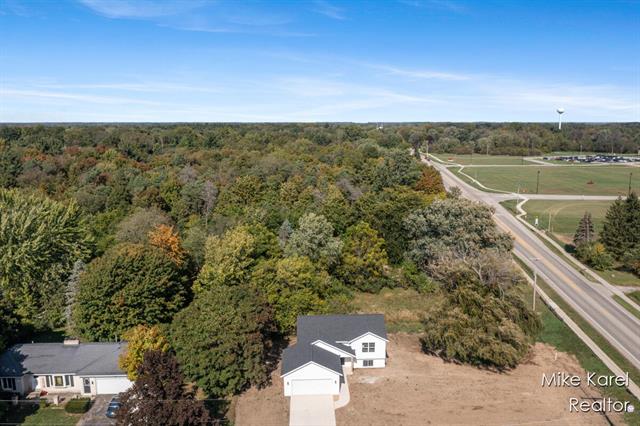 Builiding view twenty four for 10613 68Th, Allendale, MI. 49401