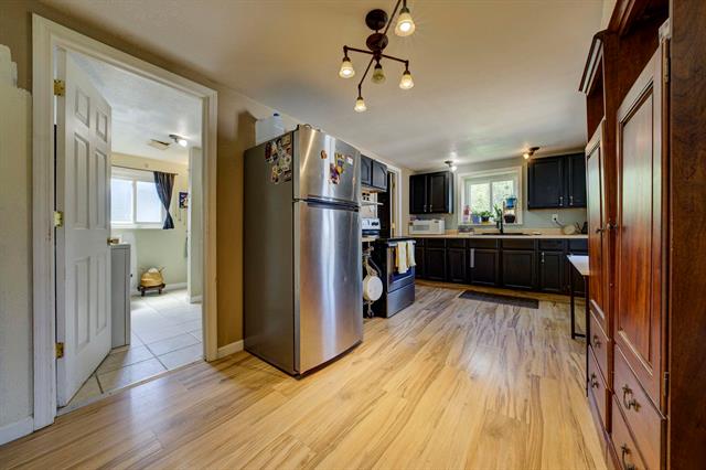 Builiding view eight for 302 Pine, Kalkaska, MI. 49646