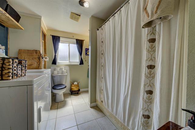 Builiding view nine for 302 Pine, Kalkaska, MI. 49646