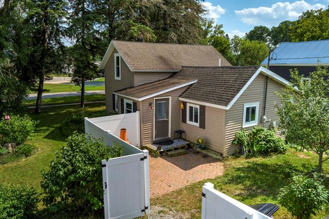 Builiding view thirty eight for 302 Pine, Kalkaska, MI. 49646