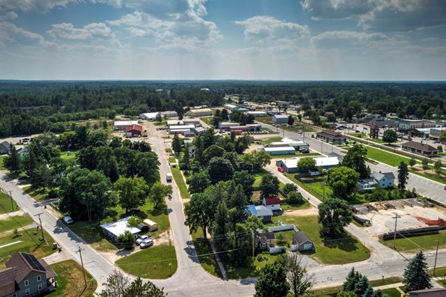 Builiding view thirty seven for 302 Pine, Kalkaska, MI. 49646