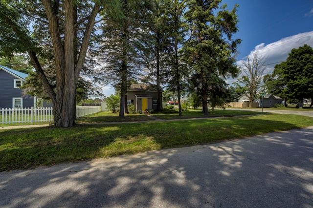 Builiding view twenty four for 302 Pine, Kalkaska, MI. 49646