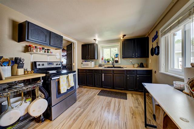 Builiding view two for 302 Pine, Kalkaska, MI. 49646