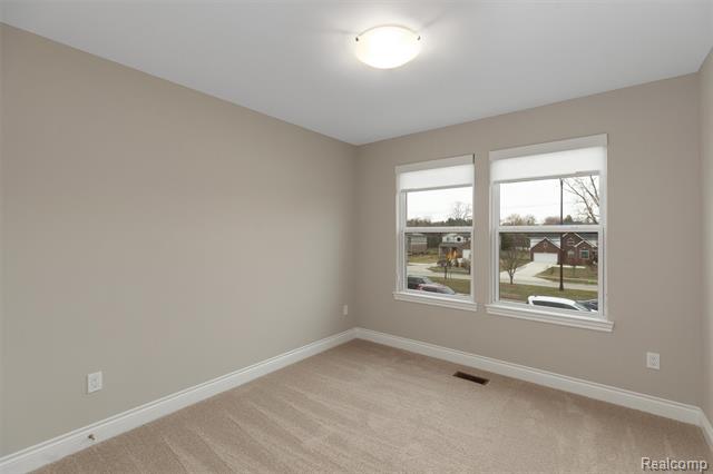 Builiding view seventeen for 807 Balmoral Ln, Troy, MI. 48085