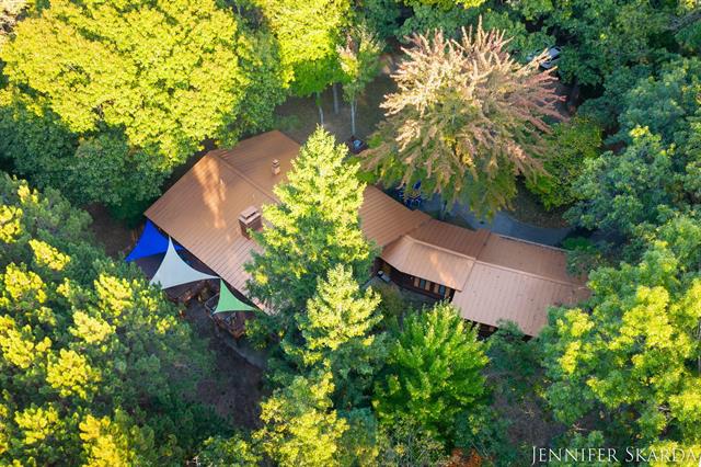 Builiding view fifty six for 7380 Leonard, Ada, MI. 49301