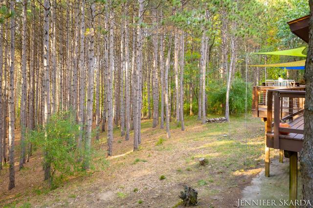 Builiding view forty nine for 7380 Leonard, Ada, MI. 49301