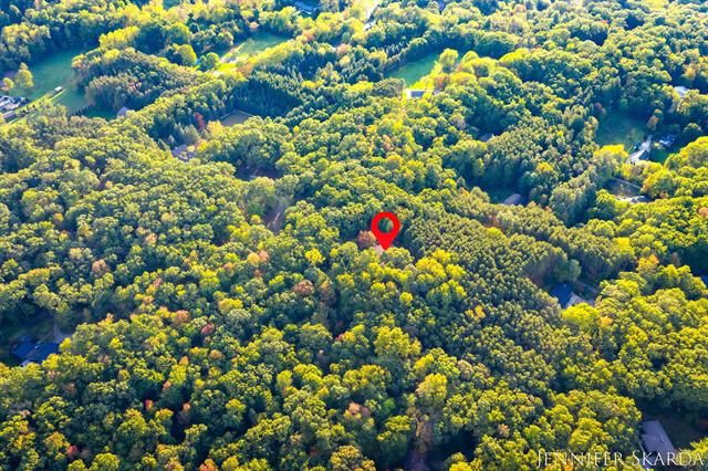 Builiding view sixty for 7380 Leonard, Ada, MI. 49301