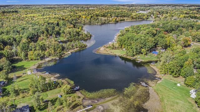 front view for 4499 Woodland Drive, Six Lakes, Mi. 48886
