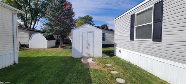 Builiding view eleven for 48575 Sandifer, Utica, MI. 48317