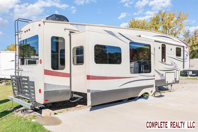 Builiding view twenty three for 831 Main St Unit 222, Au Gres, MI. 48703