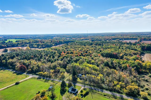 Builiding view twenty five for 1765 Fleck, Six Lakes, MI. 48886