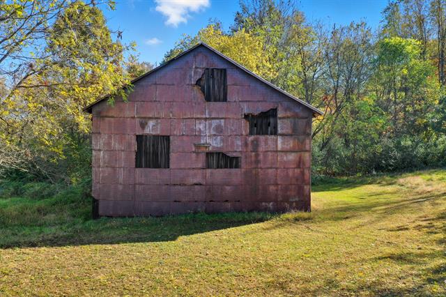 Builiding view twenty four for 1765 Fleck, Six Lakes, MI. 48886