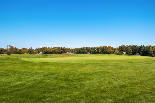 Builiding view sixty one for 5798 Bay Meadows, Traverse City, MI. 49684