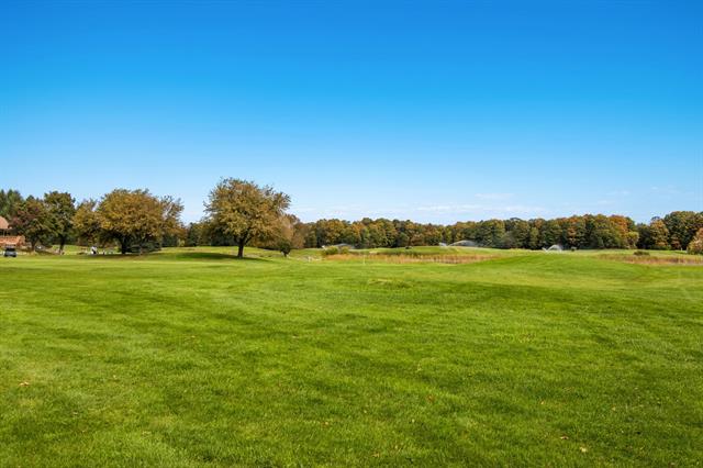 Builiding view sixty for 5798 Bay Meadows, Traverse City, MI. 49684