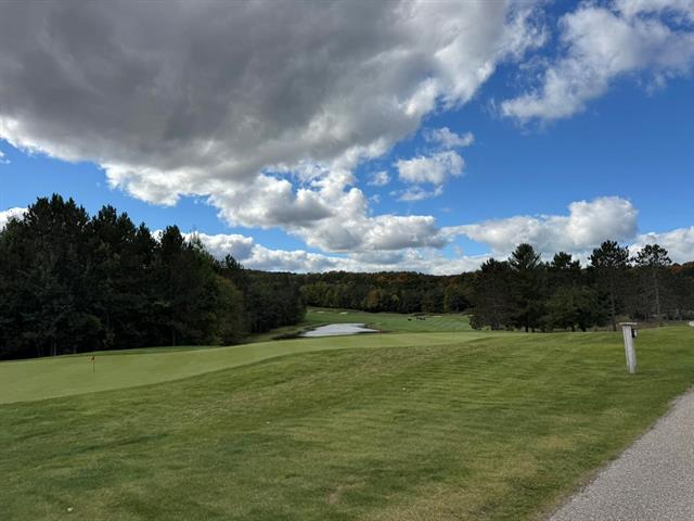 Builiding view thirty one for 2418 Hawks Eye, Bellaire, MI. 49615