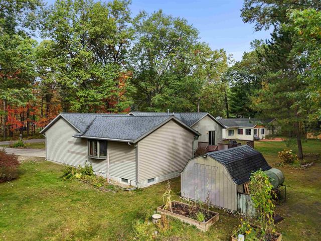 Builiding view fifty for 105 Marigold, Houghton Lake, MI. 48629