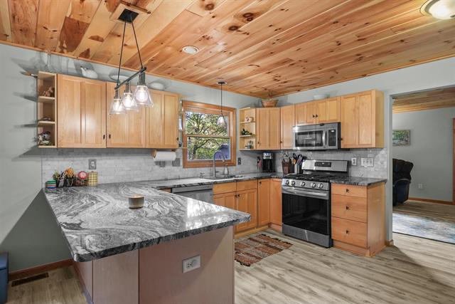 Builiding view six for 105 Marigold, Houghton Lake, MI. 48629