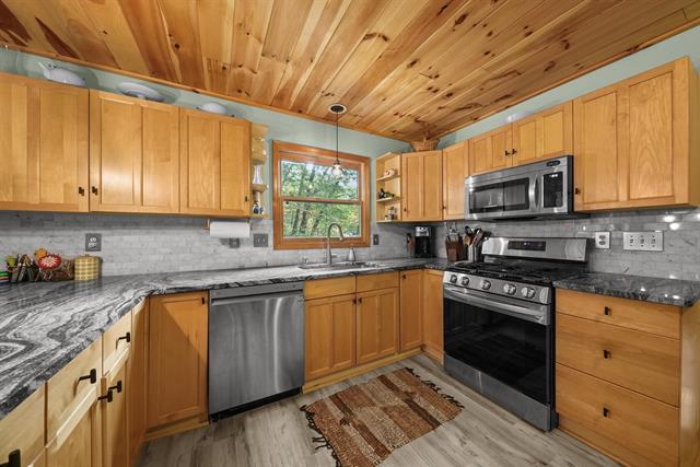 Builiding view three for 105 Marigold, Houghton Lake, MI. 48629