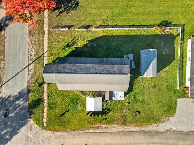 Builiding view thirty two for 149 Clark, Six Lakes, MI. 48886