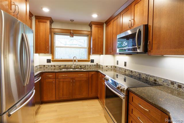 Builiding view ten for 3410 Hogback, Fowlerville, MI. 48836