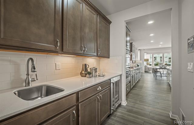 Builiding view ten for 59580 Schuss Gully, New Hudson, MI. 48165