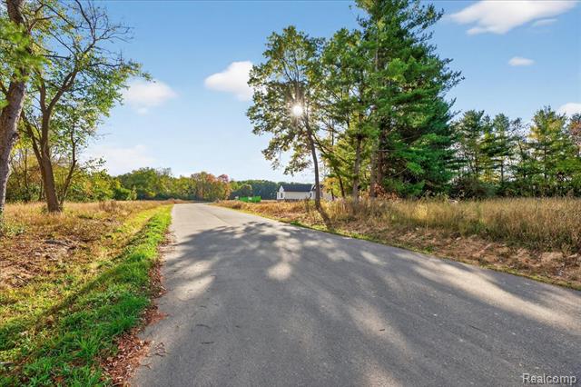 Builiding view forty nine for 4050 Metamora Ridge, Metamora, MI. 48455