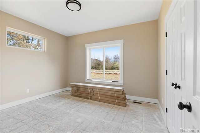 Builiding view forty seven for 4050 Metamora Ridge, Metamora, MI. 48455