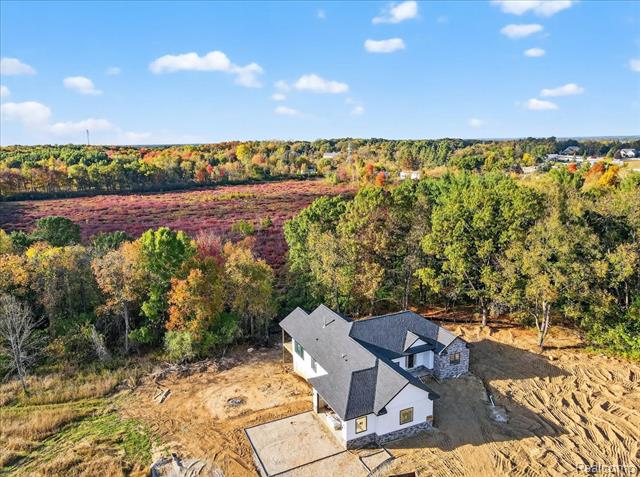 Builiding view thirty four for 4050 Metamora Ridge, Metamora, MI. 48455