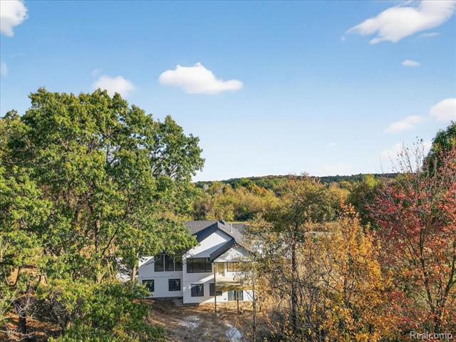 Builiding view thirty nine for 4050 Metamora Ridge, Metamora, MI. 48455